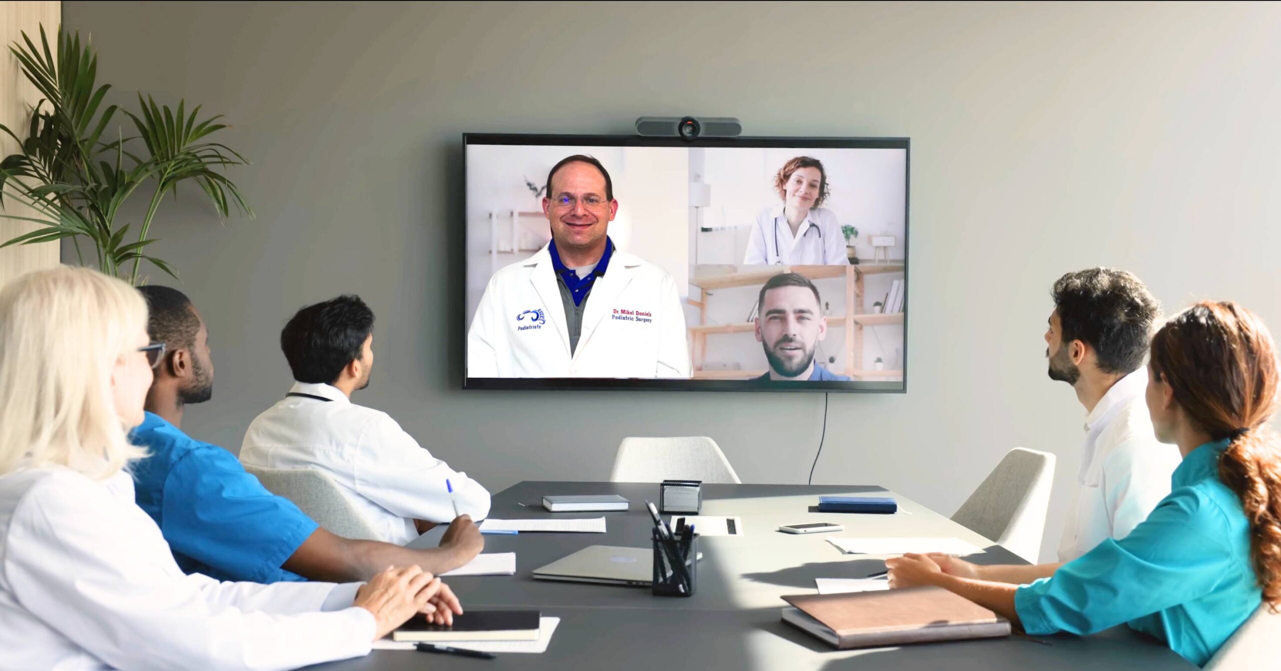Dr Mikel Daniels in a Boardroom